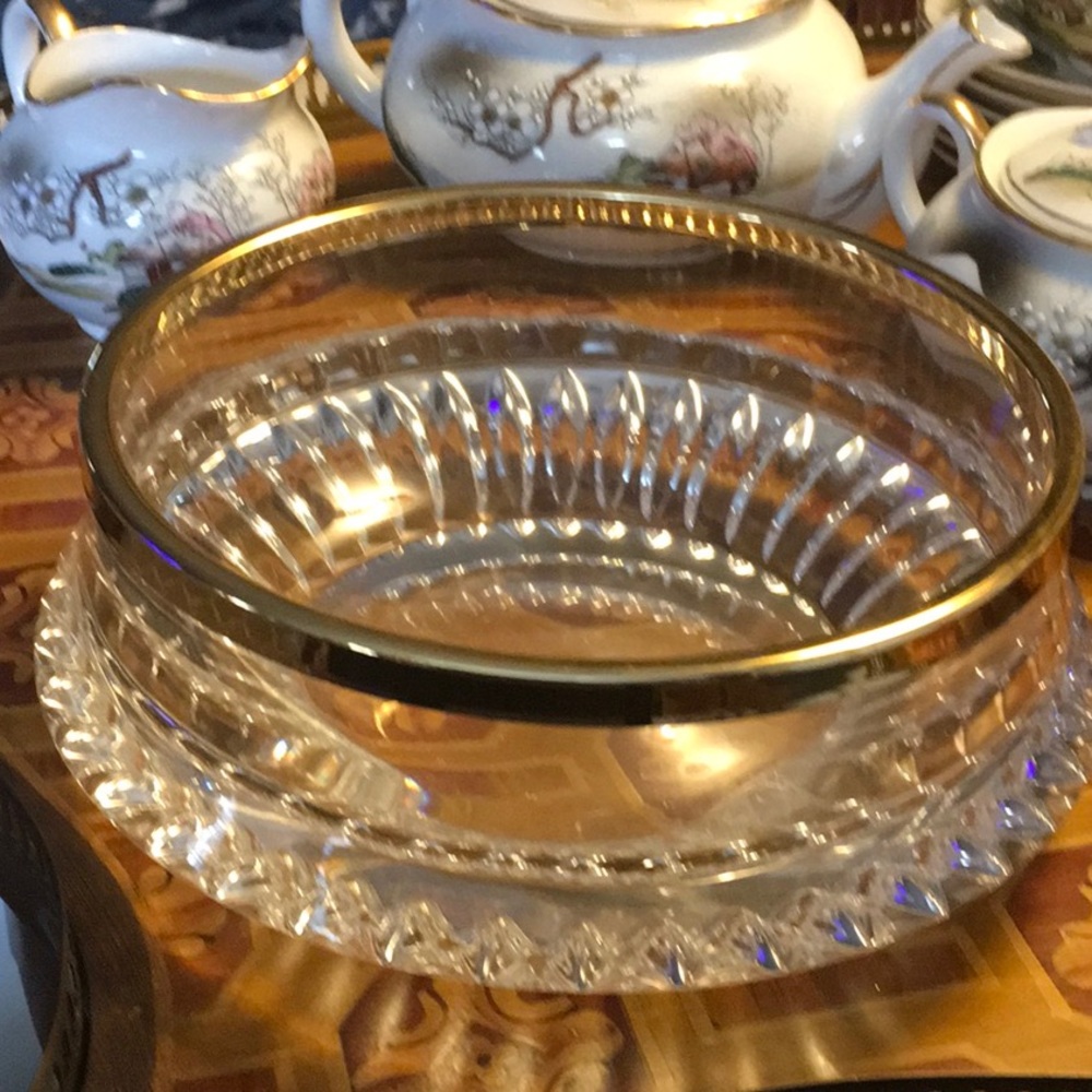 Heavy cut crystal bowl w/ brass band